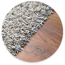Area rug over hardwood flooring